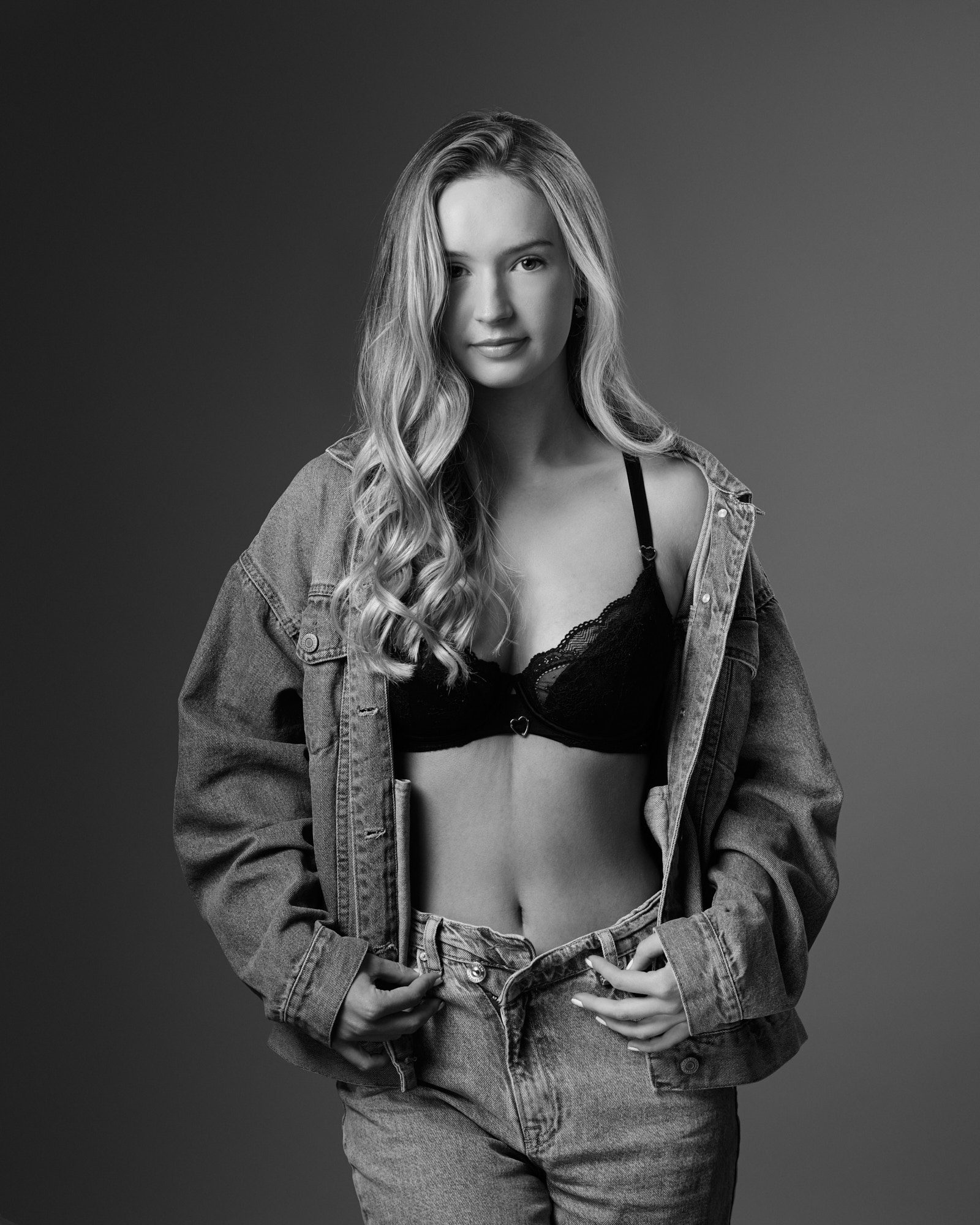 black & white portrait of dancer Gina in double denim and lingerie